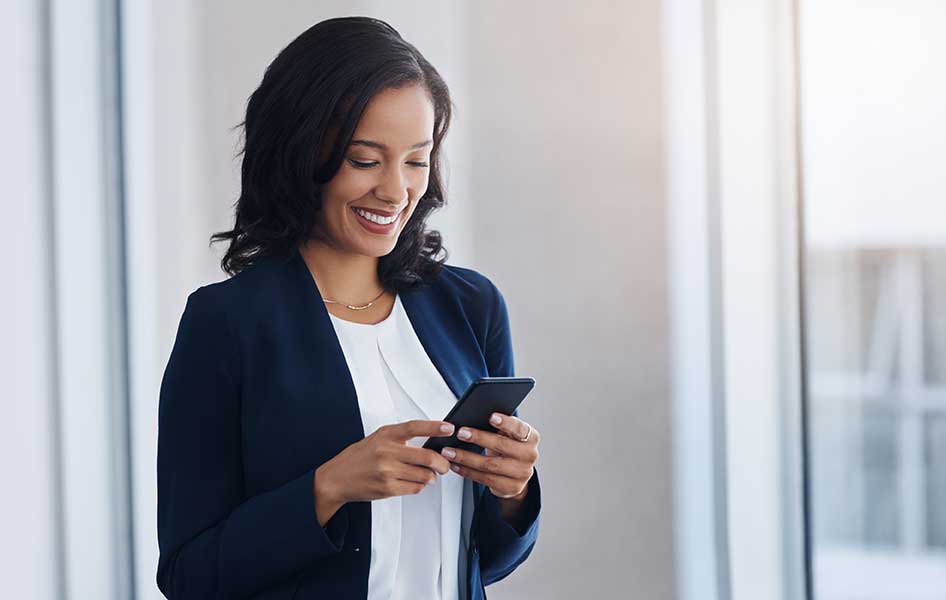 Entrepreneur smile and woman with a smartphone typing or connection